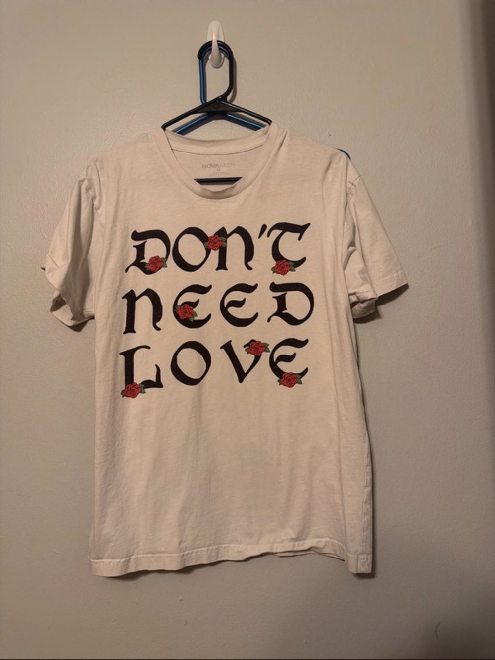 Fashion Nova White Graphic Tee with Black Text and Red Rose Accents